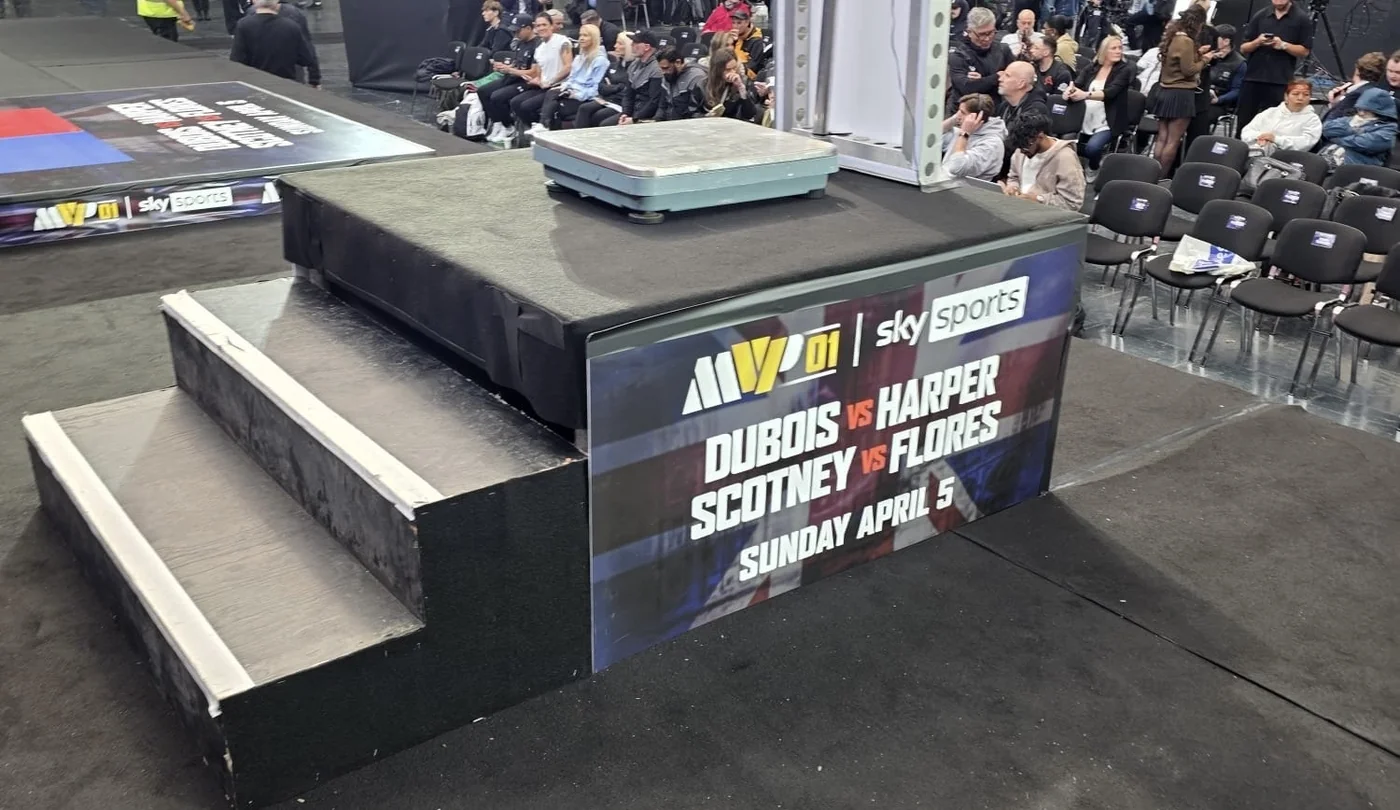 Weigh-in podium at Olympia London with our printed MVP 01 Sky Sports graphic on the front and the scales on top