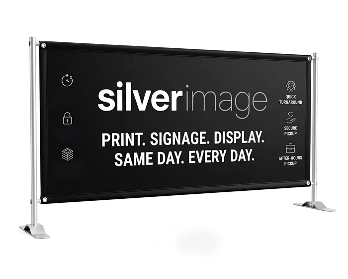 Printed PVC banner tensioned in a free-standing frame with weighted feet