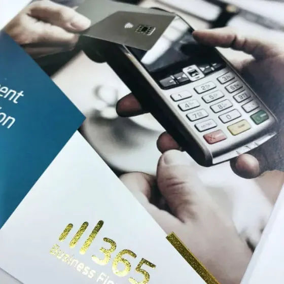 365 Business Finance brochure cover with a gold foil logo over a card payment photograph