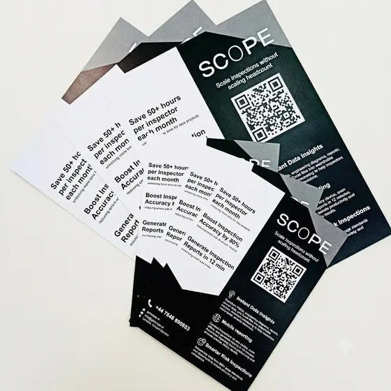 Printed flyers fanned out after trimming.