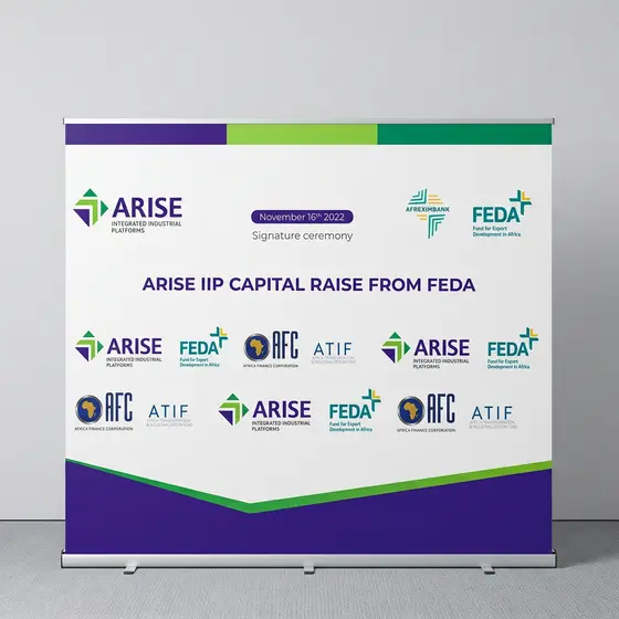 Pull-up banner printed with event sponsor logos.
