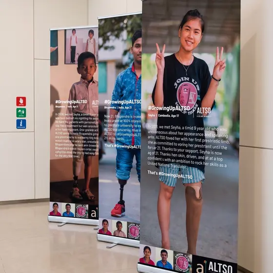 Roller banners standing in an office lobby.