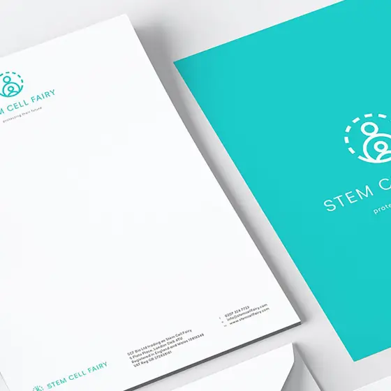 Corporate stationery laid flat: business cards, letterhead and a teal presentation folder