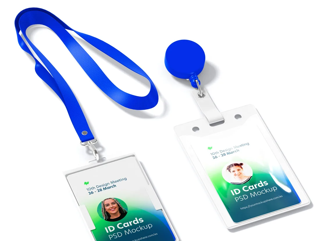 Two vertical badges in clear plastic wallets, one on a blue lanyard and one on a retractable reel clip