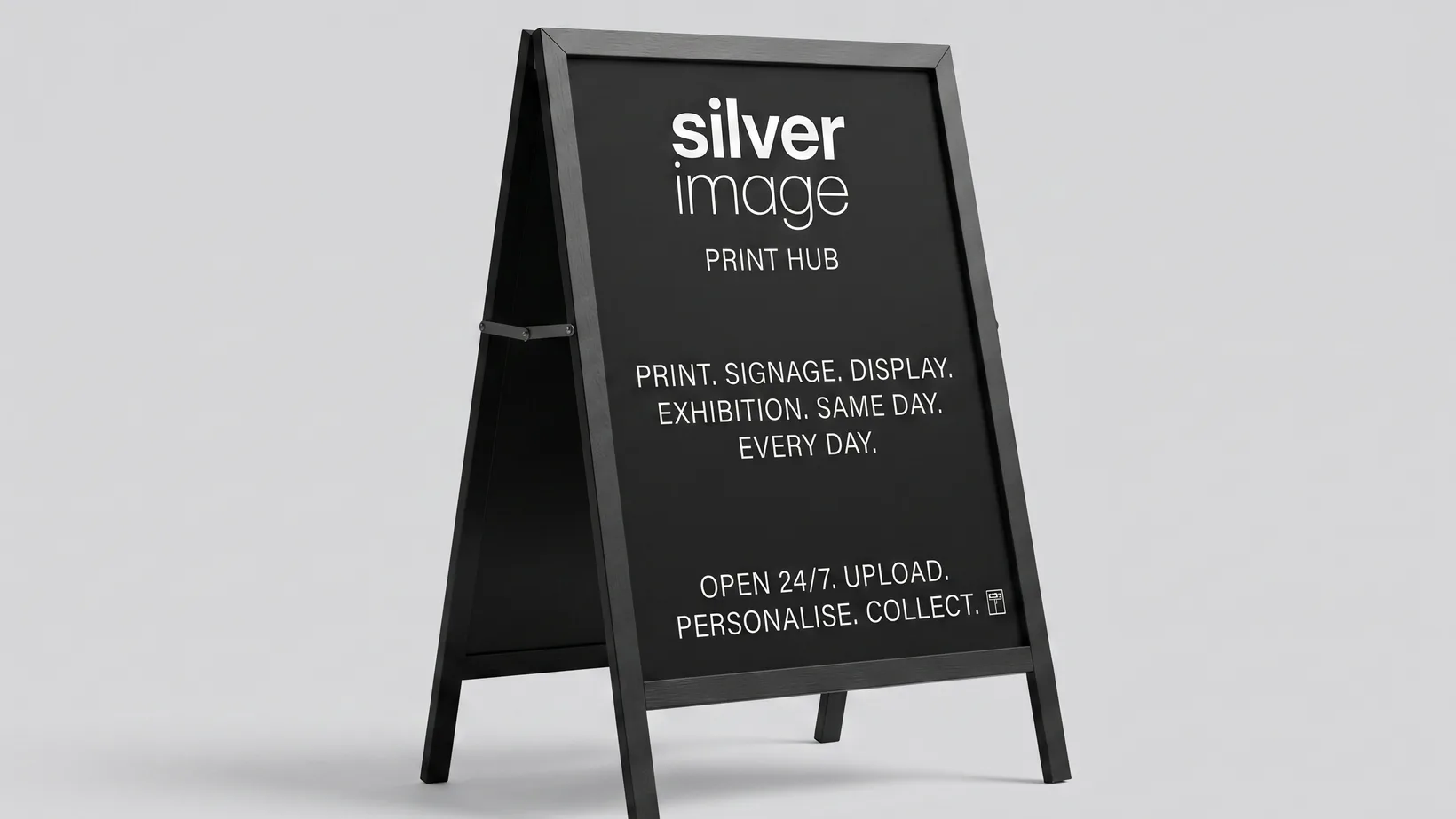 Black A-board pavement sign with a printed insert panel