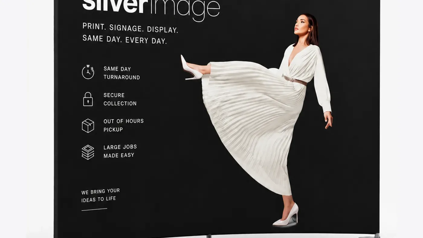 Curved fabric pop-up display with a printed tension graphic