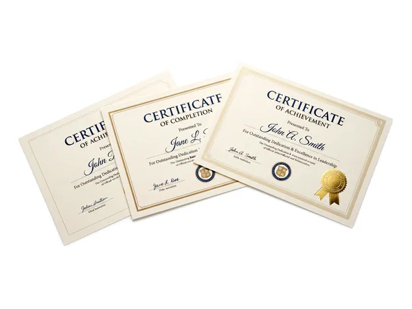 Printed certificates on textured cream stock with gold foil seals