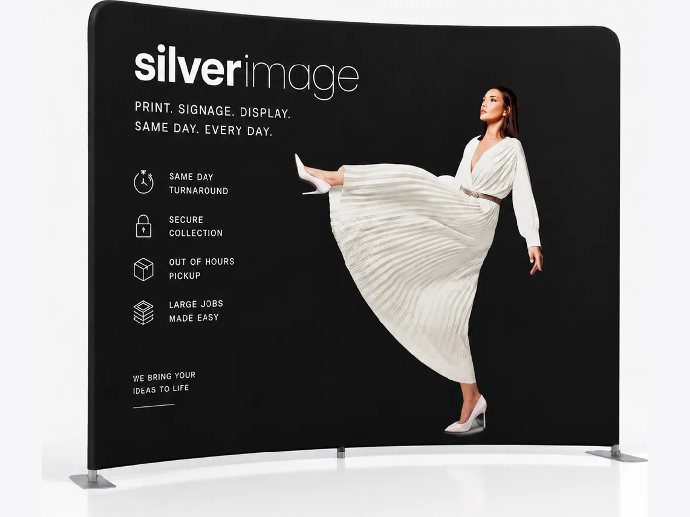 Curved fabric display wall with printed tension graphic, produced for an exhibition stand