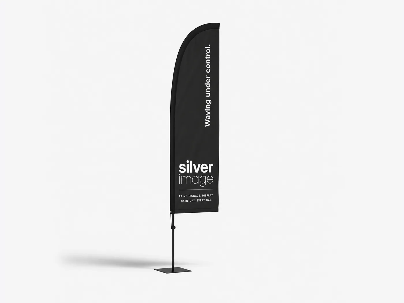 Feather flag on a fibreglass mast with a weighted ground base