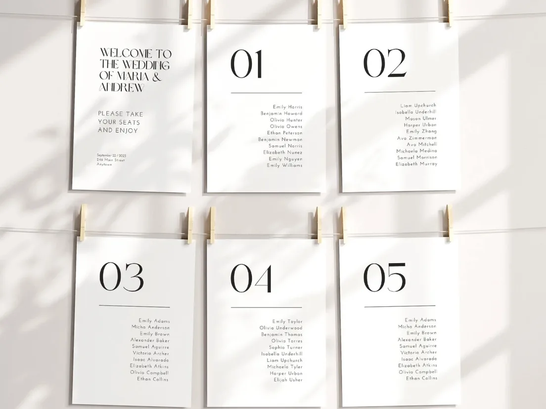 Six separate numbered table cards arranged in a grid on a pale wall